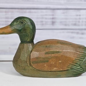 Vintage hand carved and painted wooden duck with poseable head