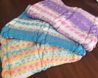 Colourful cable knit baby blankets