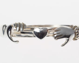 Three Sterling Silver 925 Rings in One Hands and Heart