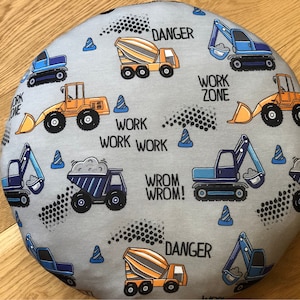 Seat cushion for children's construction site vehicles