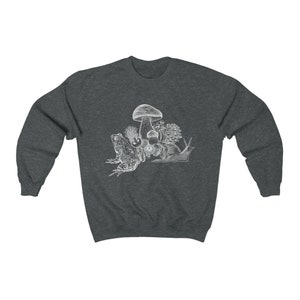 May include: A dark heather grey sweatshirt with a white graphic of a frog, snail, and mushrooms.