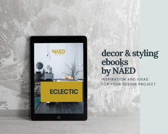 Pode incluir: Um tablet mostrando a capa de um livro digital com uma foto do interior de um banheiro. A capa é intitulada "Eclectic" e apresenta o texto "decor & styling ebooks by NAED" e "Inspiration and ideas for your design project".