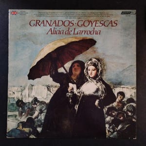May include: Vintage vinyl record album cover featuring a painting of two women under an umbrella. The album title is "Granados Goyescas" by Alicia de Larrocha. The cover art is a classical painting with muted colors.
