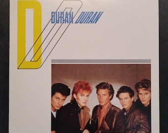 Duran Duran - 1981 New Wave Vinyl Record  80s Classic / Planet Earth / Girls On Film