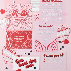 The ultimate red and pink wedding stationery! Featuring a bursting heart design, retro font and fun wording, this is the Malibu collection. Including a save the date, invitation, information card, rsvp and custom quote card.