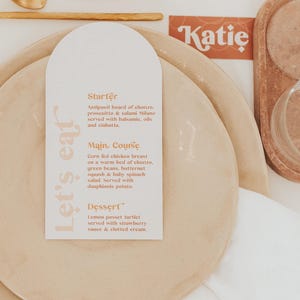 Modern boho wedding invitation suite. Featuring elegant curved shapes and a subtle floral design, this collection can be adapted to your colours. Slim, arch shape menu which can be customised with guest names. Place cards also available.
