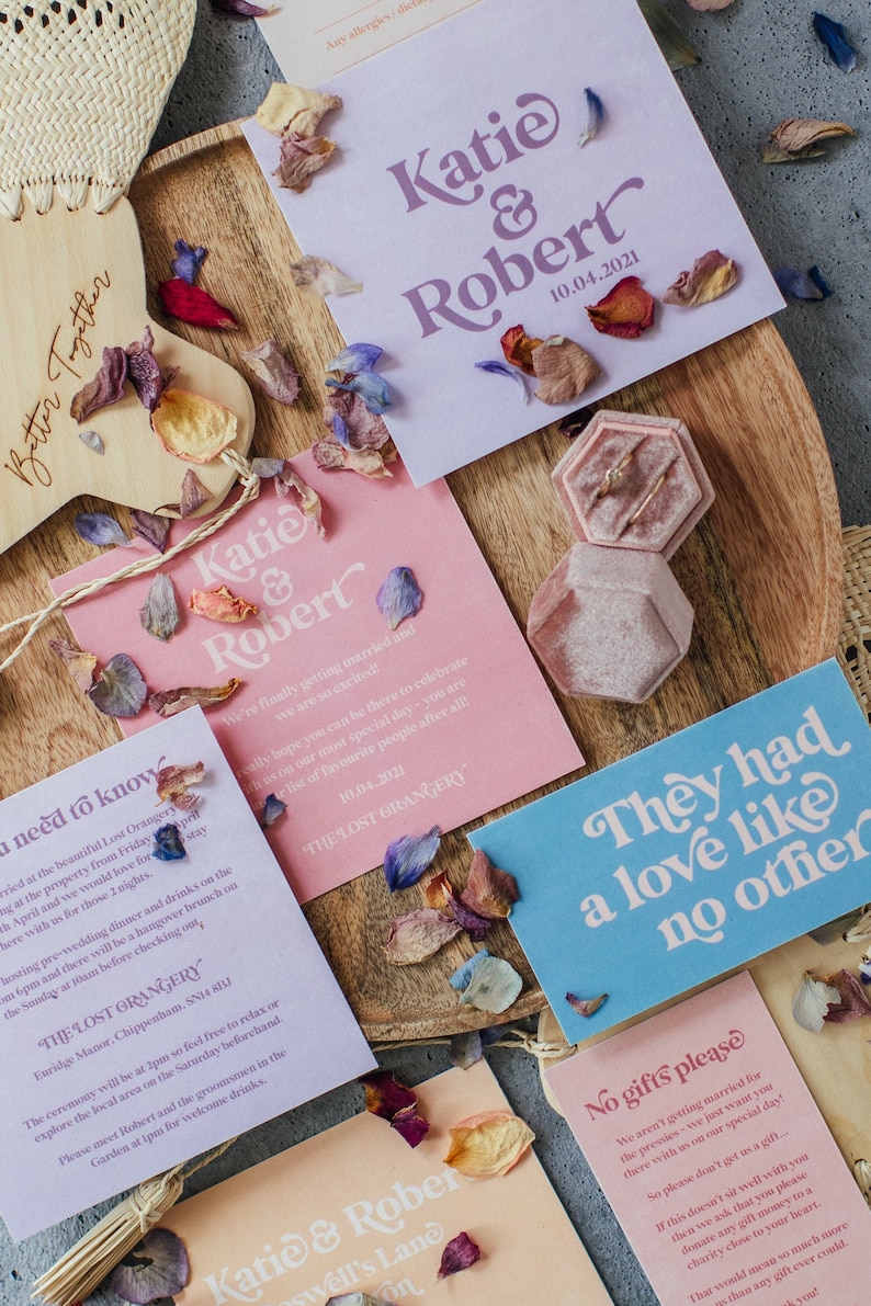 Modern boho wedding invitation suite. Featuring a retro font and muted brights, the Devon collection is the ultimate all-rounder. Includes a save the date, invitation, information card, gift list card and rsvp. On the day stationery also available.