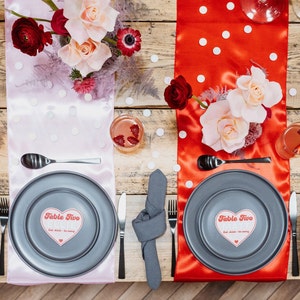 The ultimate red and pink wedding stationery! Featuring a bursting heart design, retro font and fun wording, this is the Malibu collection. On the day stationery including heart shape place cards, menus, table numbers, welcome signs and table plans.