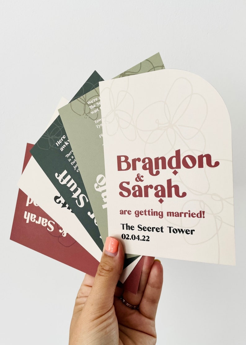 Modern boho wedding invitation suite. Featuring elegant curved shapes and a subtle floral design, this collection can be adapted to your colours. Includes a save the date, invitation, information card and rsvp. On the day stationery also available.