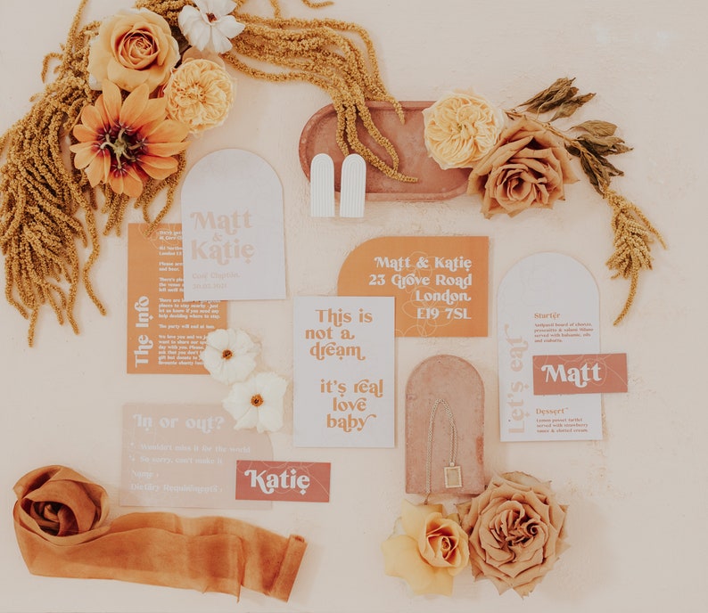 Modern boho wedding invitation suite. Featuring elegant curved shapes and a subtle floral design, this collection can be adapted to your colours. Includes a save the date, invitation, information card and rsvp. On the day stationery also available.