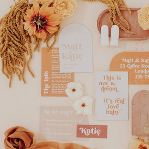 Modern boho wedding invitation suite. Featuring elegant curved shapes and a subtle floral design, this collection can be adapted to your colours. Includes a save the date, invitation, information card and rsvp. On the day stationery also available.