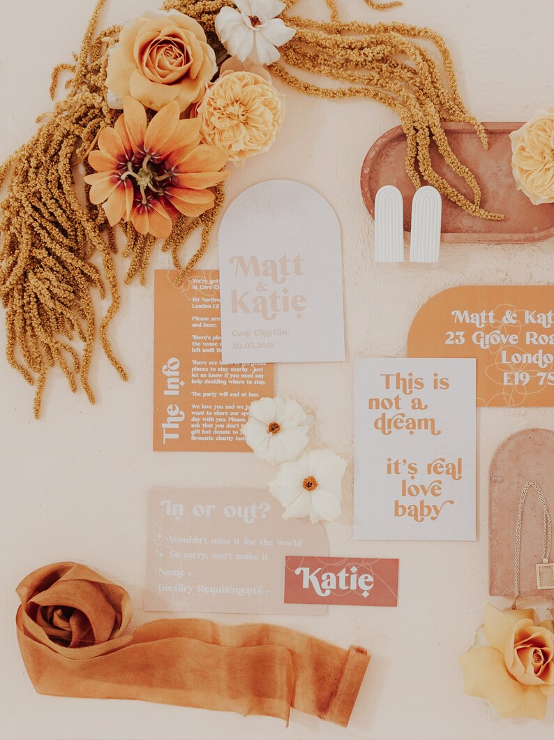 Modern boho wedding invitation suite. Featuring elegant curved shapes and a subtle floral design, this collection can be adapted to your colours. Includes a save the date, invitation, information card and rsvp. On the day stationery also available.