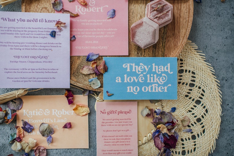 Modern boho wedding invitation suite. Featuring a retro font and muted brights, the Devon collection is the ultimate all-rounder. Includes a save the date, invitation, information card, gift list card and rsvp. On the day stationery also available.