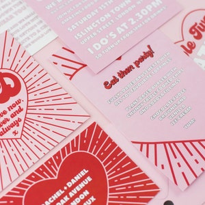 The ultimate red and pink wedding stationery! Featuring a bursting heart design, retro font and fun wording, this is the Malibu collection. Including a save the date, invitation, information card, rsvp and custom quote card.