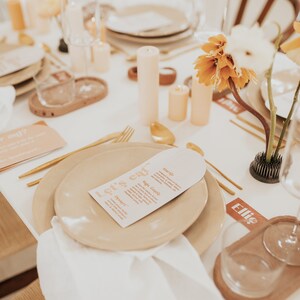 Modern boho wedding invitation suite. Featuring elegant curved shapes and a subtle floral design, this collection can be adapted to your colours. Slim, arch shape menu which can be customised with guest names. Place cards also available.