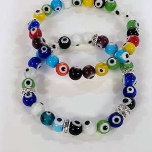 Braccialetto di protezione tondo da 8 mm contro il malocchio, elastico con tondo di strass o senza strass. Regalo uomo donna, Chakra