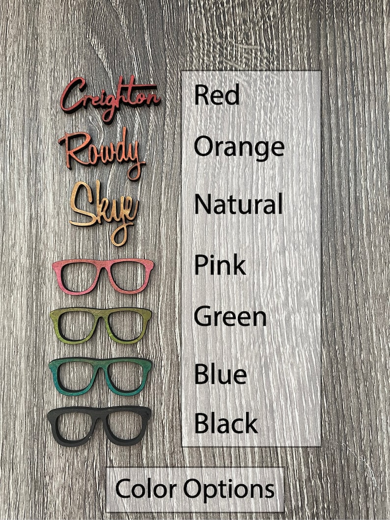 May include: Wooden glasses with different color options: red, orange, natural, pink, green, blue, and black. The text "Color Options" is below the glasses.