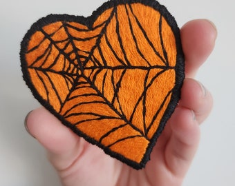 Embroidered patch - orange heart web