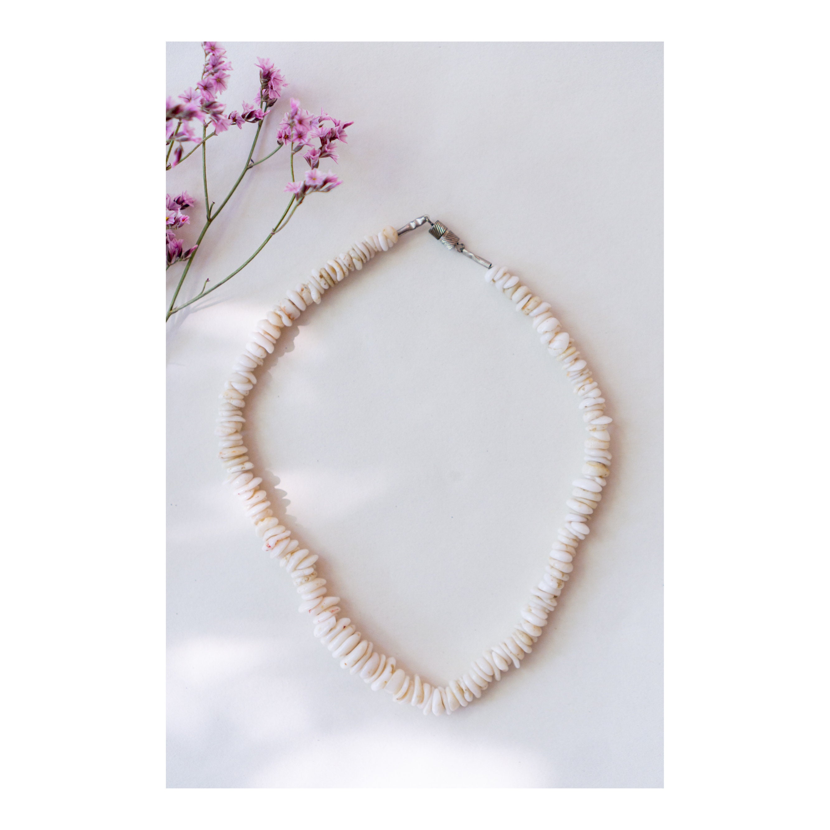 Sold at Auction: vtg 70's genuine puka shell necklace & bracelet