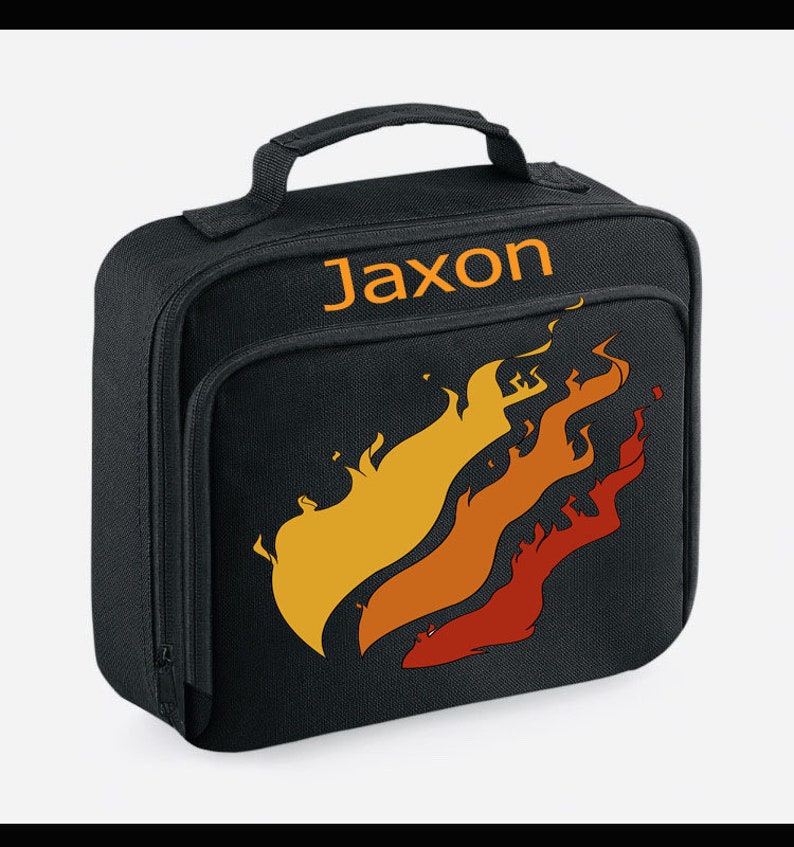 May include: Black lunch bag with a personalized name "Jaxon" in orange text and a stylized orange, yellow, and red flame design.