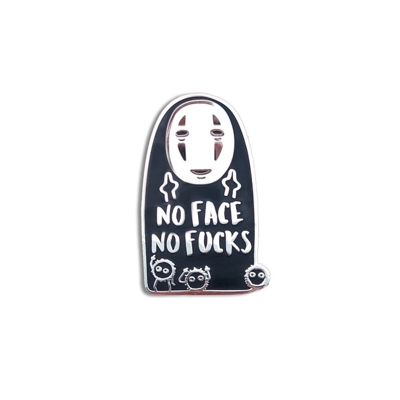 May include: A black and silver enamel pin featuring a character from Spirited Away with the text "NO FACE NO FUCKS". The pin has a white face and two hands giving the middle finger.