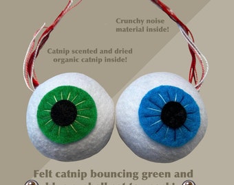 2 pack of felt catnip-scented eyeball cat toys (1 green eye and 1 blue eye)