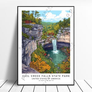 May include: A framed art print of Fall Creek Falls State Park in the United States of America. The illustration depicts a waterfall cascading into a turquoise pool, surrounded by autumn foliage and cliffs. The text at the bottom reads "FALL CREEK FALLS STATE PARK UNITED STATES OF AMERICA".