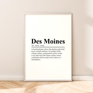May include: A black and white printable art print with the word "Des Moines" in bold text and a definition of the city. The definition reads: "A heartland gem where big dreams and small town warmth embrace. Its golden fields, vibrant culture, and genuine smiles create a city that feels like home a place where community thrives and every sunset is a masterpiece."
