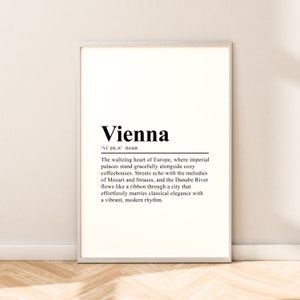 Puede incluir: Una definición imprimible en blanco y negro de la palabra "Viena" con el texto: "El corazón danzante de Europa, donde los palacios imperiales se alzan con gracia junto a acogedoras cafeterías. Las calles resuenan con las melodías de Mozart y Strauss, y el Danubio fluye como una cinta a través de una ciudad que fusiona sin esfuerzo la elegancia clásica con un ritmo moderno y vibrante."