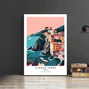 May include: A colorful illustration of the Cinque Terre region of Italy, featuring a seaside village with colorful buildings, a boat in the water, and a pink sky. The text "Cinque Terre, Italy, 44.1461&deg; N, 9.6430&deg; E" is printed below the image.