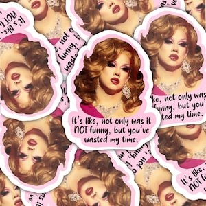May include: A pink and white sticker with a woman's face and the text "It's like, not only was it NOT funny, but you've wasted my time."