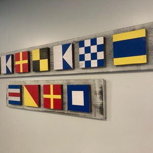 Nautical flag signs customize your personal nautical flag sign.nautical flag represents a letter from the alphabet.coastal navy hand painted