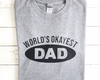 World’s Okayest Dad shirt.