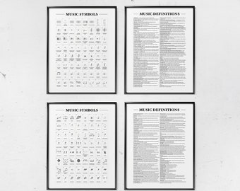 May include: Four black framed posters on a white wall. Two posters are titled "Music Symbols" and feature a grid of musical symbols. The other two posters are titled "Music Definitions" and feature text definitions of musical terms.