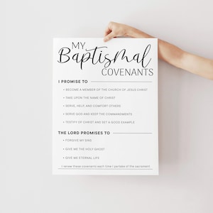 May include: A white rectangular print with the text "MY Baptismal COVENANTS" in a decorative font. The print lists promises and blessings related to baptism, including becoming a member of the church and receiving eternal life.