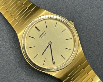 Seiko Watch Vintage Seiko Quartz Classic Seiko Mens Unisex Dress Watch  Quartz Yellow Dial