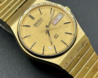 Vintage Seiko SQ 6923-7099 Gold Tone Day Date Faceted Crystal Men’s Quartz Watch