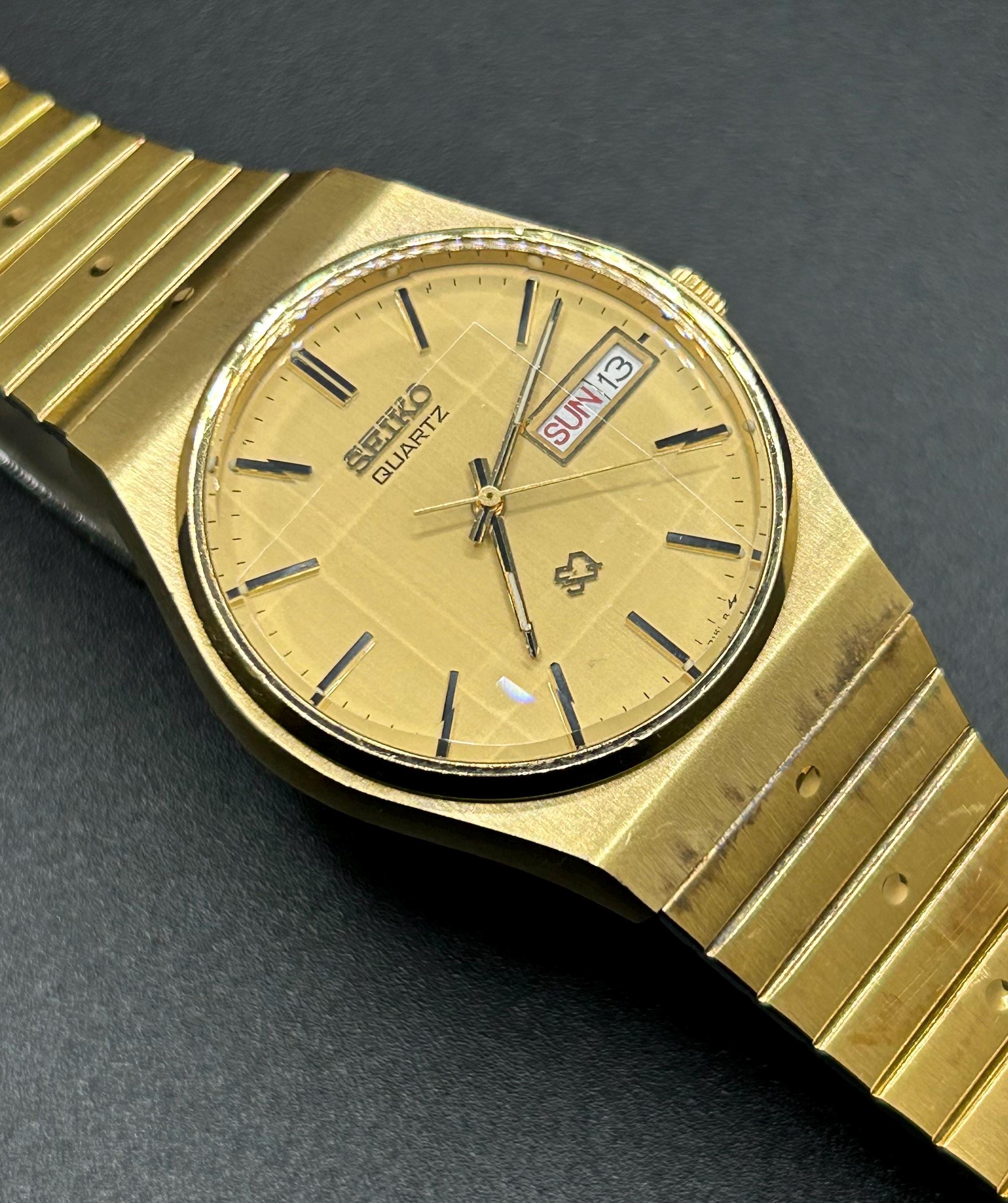 Vintage Seiko SQ 6923-7099 Gold Tone Day Date Faceted Crystal