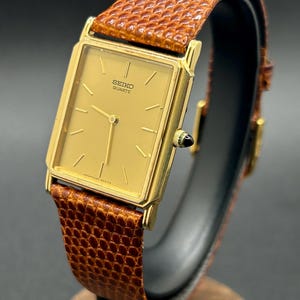 Vintage Seiko 9020-5019 Tank Style Gold Tone Rectangular Dial Brown Leather Strap Men’s Dress Quartz Watch
