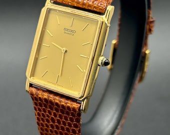 Vintage Seiko 9020-5019 Tank Style Gold Tone Rectangular Dial Brown Leather Strap Men’s Dress Quartz Watch