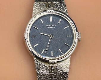 Vintage Dainty Seiko 1400-0259 Silver Tone Dress Minimalist Blue Dial Women’s Quartz Watch