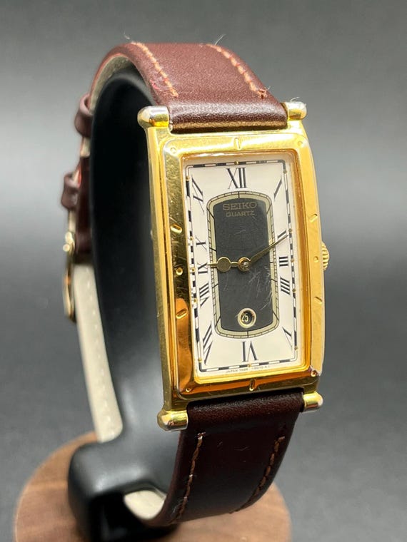 Vintage Rare 1990s Seiko Age of Discovery 7N89-5009 Tank Gold Tone Roman Dial Date Quartz Men’s Watch View 2