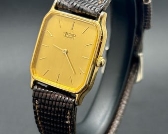 Vintage Seiko 6530-5770 Gold Tone Rectangular Dial Brown Leather Strap Men’s Quartz Dress Watch