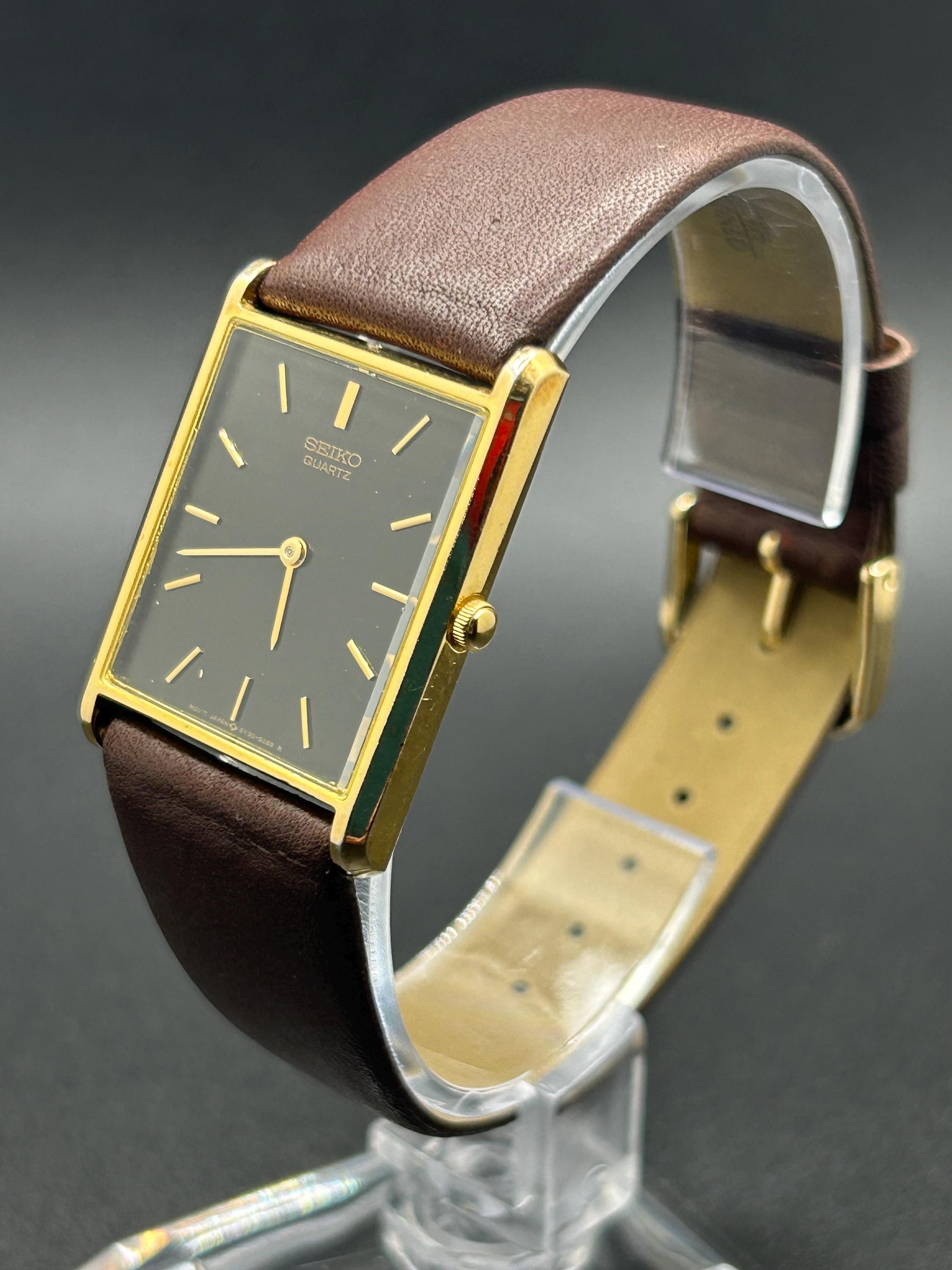 Vintage Seiko 5Y30-5069 Gold Tone Rectangular Case Black Dial 