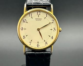 Vintage Seiko 5Y30-7009 Gold Tone Minimalist Dress Watch 1980s Cream Dial Men’s Quartz Watch 32.5mm