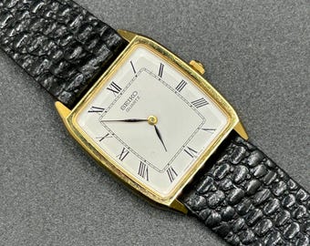 Vintage 1980s Seiko Unisex Tank Quartz Gold Tone Roman Dial 26mm Minimalist Classic Dress Watch