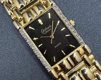 Vintage Galaxie by Elgin Black Dial Gold Tone Rectangular Case Men’s Quartz Dress Watch