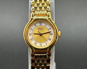 Vintage Seiko V401-0289 Gold Tone Roman Numeral Dial Multi Row Bracelet Women’s Quartz Dress Watch