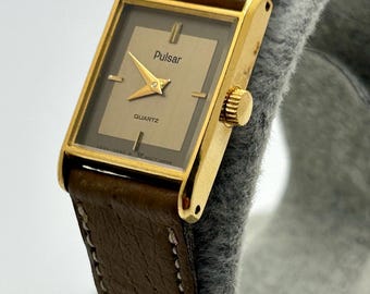 Reloj de cuarzo vintage Pulsar estilo tanque en tono dorado para mujer V232-5520