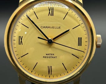 Vintage Caravelle Men’s Mechanical Wind-Up Watch, Gold-Tone Roman Dial, Classic Dress Watch, 1970s Caravelle by Bulova